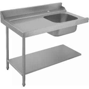Stainless steel commercial kitchen sink with backsplash.